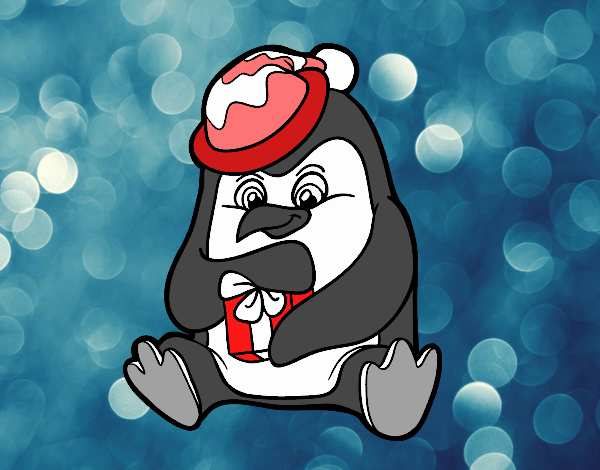 Un pinguino con un regalo di Natale