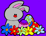 Disegno Coniglietto di Pasqua  pitturato su un mare di colore