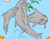 Disegno Delfini che giocano  pitturato su colore