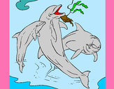 Disegno Delfini che giocano  pitturato su daniela