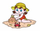 Una ragazza che giocano sulla spiaggia